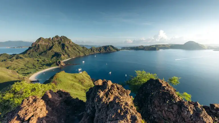 Panorama of Padar Island's hills and bays seen from the rocky summit viewpoint