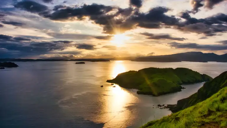 Brown savanna grassland on the ridge of Padar Island lit by sun in the dry season