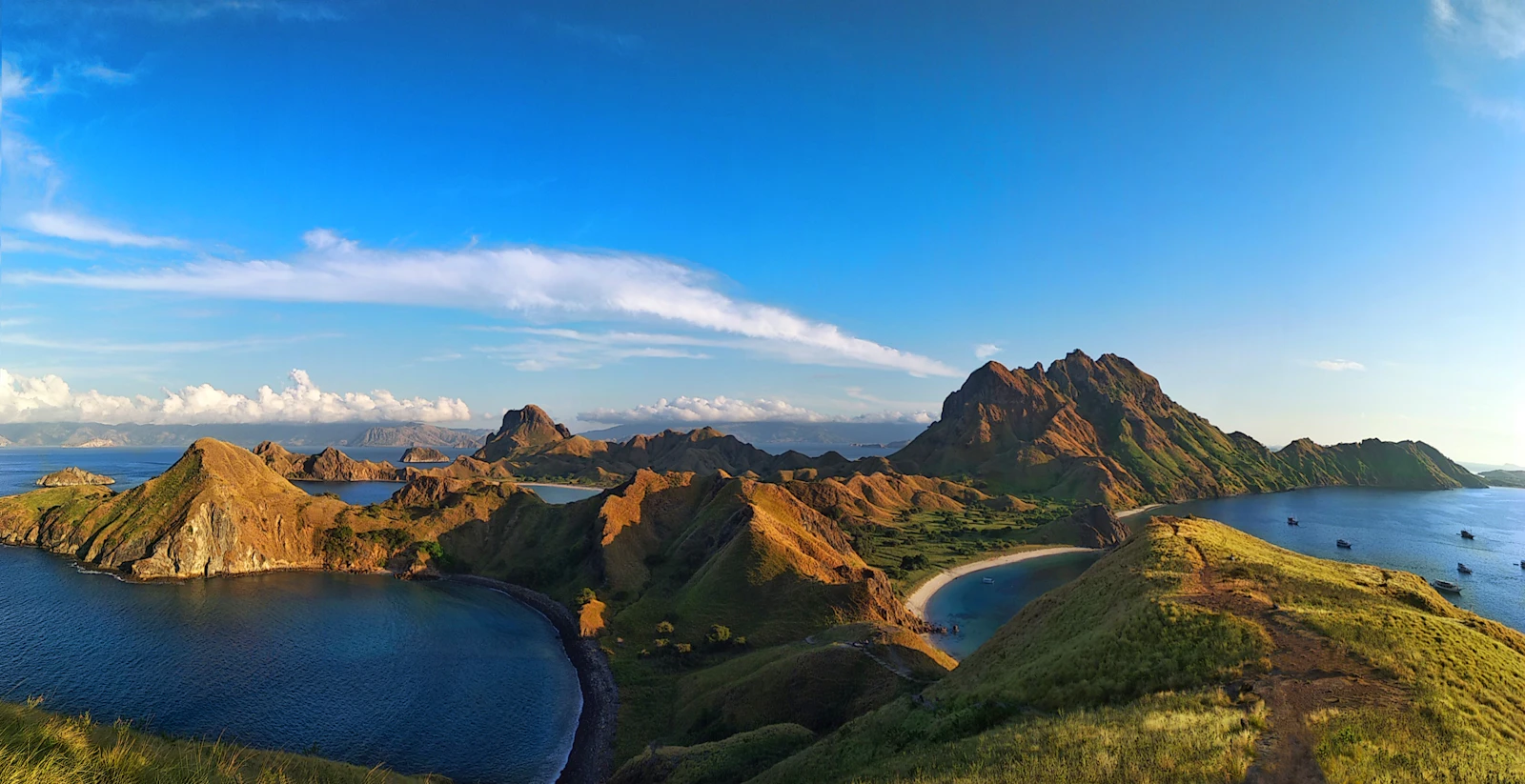 Sunrise light over the bays and hills of Padar Island in Komodo National Park